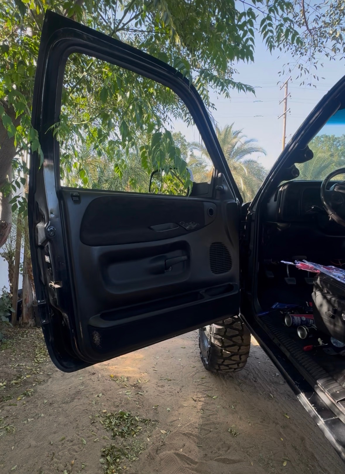 Restored black door panel installed by Ethreal Customs