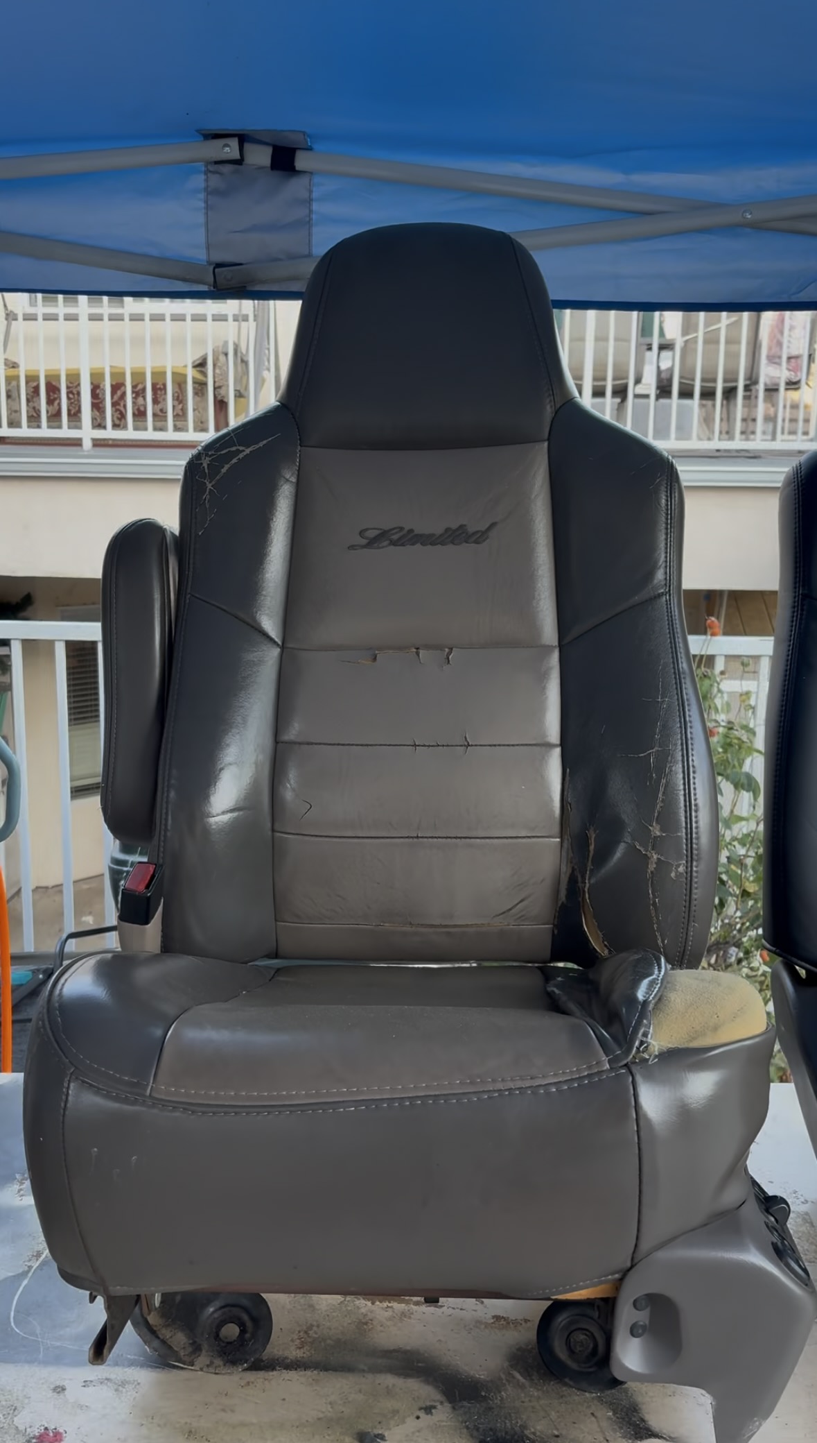Damaged captain’s seat before restoration